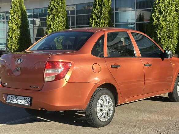 2014 Lada (ВАЗ) Granta I, оранжевый, 325000 рублей - вид 5