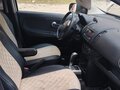 2012 Nissan Note I Рестайлинг, белый, 840000 рублей - вид 4