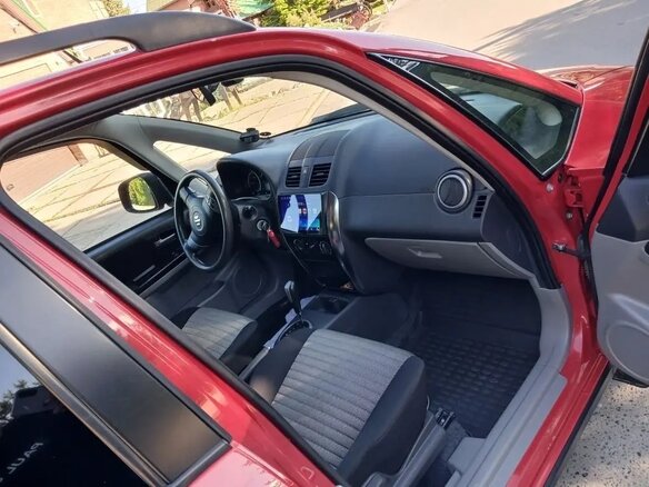 2012 Suzuki SX4 I (Classic) Рестайлинг, красный, 1037000 рублей - вид 13