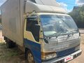 1994 Isuzu Elf (N-series), синий, 1500000 рублей - вид 1