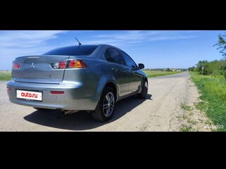 2012 Mitsubishi Lancer X Рестайлинг, серебристый, 1350000 рублей, вид 4