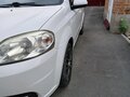 2011 Chevrolet Aveo I Рестайлинг, белый, 555000 рублей - вид 5
