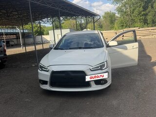 2010 Mitsubishi Lancer X, белый, 700000 рублей, вид 1