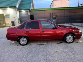 2010 Daewoo Nexia I Рестайлинг, пурпурный, 200000 рублей, вид 4