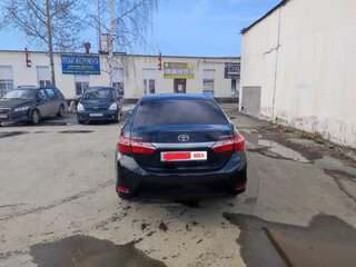 2015 Toyota Corolla XI (E160, E170, E180), чёрный, 1000000 рублей, вид 3
