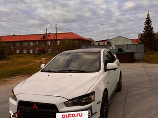 2010 Mitsubishi Lancer X, белый, 900000 рублей, вид 1