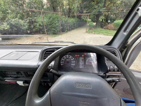 2005 Isuzu Elf (N-series), белый, 1650000 рублей - вид 24