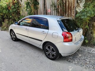 2004 Toyota Corolla IX (E120, E130), серебристый, 650000 рублей, вид 5