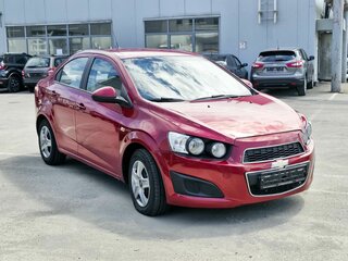 2014 Chevrolet Aveo II, красный, 390000 рублей, вид 2