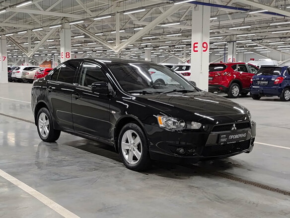 2010 Mitsubishi Lancer X, чёрный - вид 2