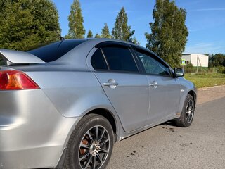 2009 Mitsubishi Lancer X, серебристый, 550000 рублей, вид 4