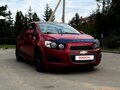 2012 Chevrolet Aveo II, красный, 730000 рублей - вид 1