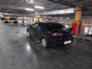 2010 Mitsubishi Lancer X, чёрный, 650000 рублей, вид 4
