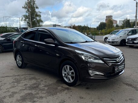 2014 Hyundai Solaris I Рестайлинг, коричневый, 1075000 рублей, вид 4