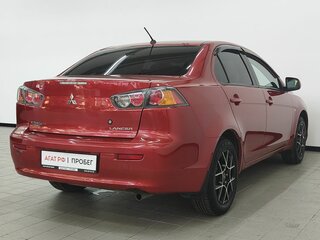 2010 Mitsubishi Lancer X, красный, 699000 рублей, вид 5