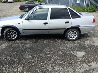 2011 Daewoo Nexia I Рестайлинг, серебристый, 145000 рублей, вид 4