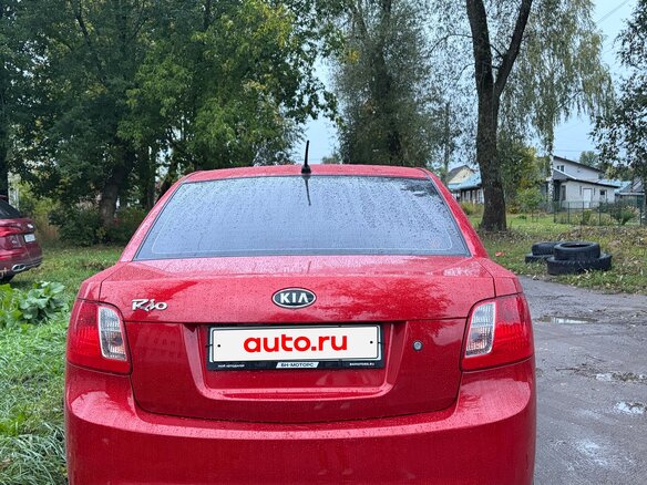 2011 Kia Rio II Рестайлинг, красный - вид 1