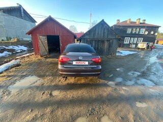 2016 Volkswagen Jetta VI Рестайлинг, коричневый, 850000 рублей, вид 2