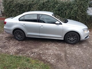 2012 Volkswagen Jetta VI, серебристый, 875000 рублей, вид 3