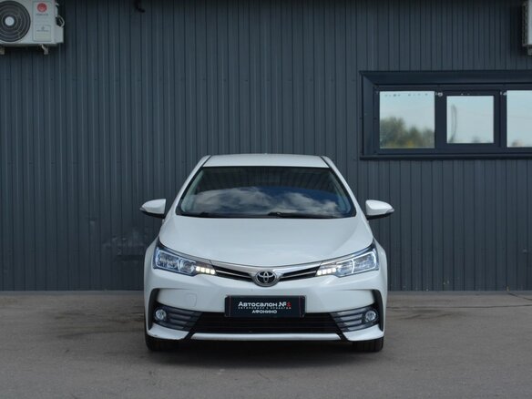 2018 Toyota Corolla XI (E160, E170, E180) Рестайлинг 1, белый, 1299888 рублей - вид 1