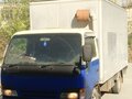 1995 Isuzu Elf (N-series), бежевый, 500000 рублей - вид 1