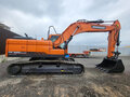 2026 Develon DX225, оранжевый, 18566658 рублей - вид 1