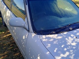 1997 Toyota Corolla VII (E100), белый, 165000 рублей, вид 3