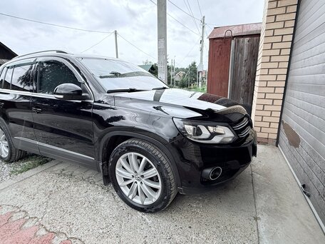 2014 Volkswagen Tiguan I Рестайлинг, чёрный, 1650000 рублей, вид 2