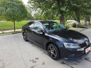 2015 Volkswagen Jetta VI Рестайлинг, чёрный, 700000 рублей, вид 2