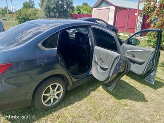 2013 Nissan Almera III (G15), синий, 650000 рублей, вид 2