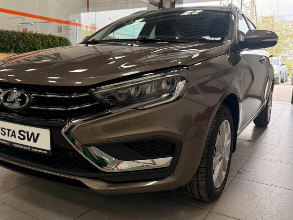 2026 Lada (ВАЗ) Vesta SW I Рестайлинг (NG), коричневый - вид 10