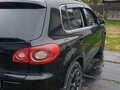 2011 Volkswagen Tiguan I, чёрный, 850000 рублей - вид 6