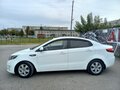 2014 Kia Rio 4-speed III, белый, 785000 рублей - вид 5