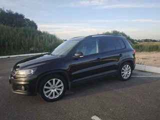 2013 Volkswagen Tiguan I Рестайлинг, чёрный, 1000000 рублей, вид 3