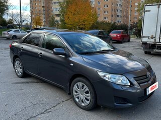 2010 Toyota Corolla X (E140, E150), серый, 910000 рублей, вид 2