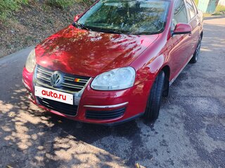 2009 Volkswagen Jetta V, пурпурный, 500000 рублей, вид 1
