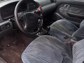 2000 Kia Clarus II, серебристый, 130000 рублей - вид 5