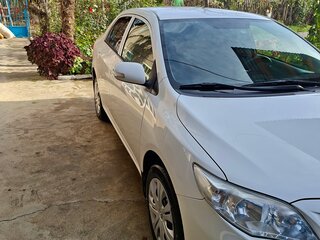 2013 Toyota Corolla X (E140, E150) Рестайлинг, белый, 1150000 рублей, вид 3