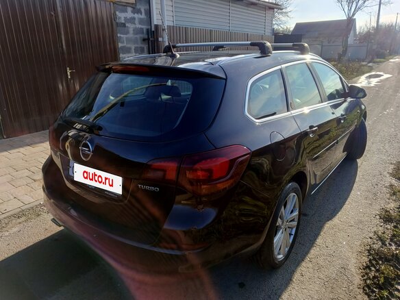2012 Opel Astra J Рестайлинг, коричневый, 800000 рублей - вид 3