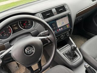 2015 Volkswagen Jetta VI Рестайлинг, чёрный, 950000 рублей, вид 5
