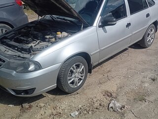 2012 Daewoo Nexia I Рестайлинг, серебристый, 180000 рублей, вид 1