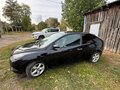 2010 Ford Focus II Рестайлинг, чёрный, 580000 рублей - вид 3