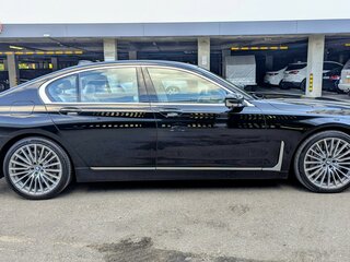 2019 BMW 7 серии 750i xDrive VI (G11/G12) Рестайлинг, чёрный, 6400000 рублей, вид 3