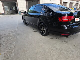 2015 Volkswagen Jetta VI Рестайлинг, чёрный, 700000 рублей, вид 5
