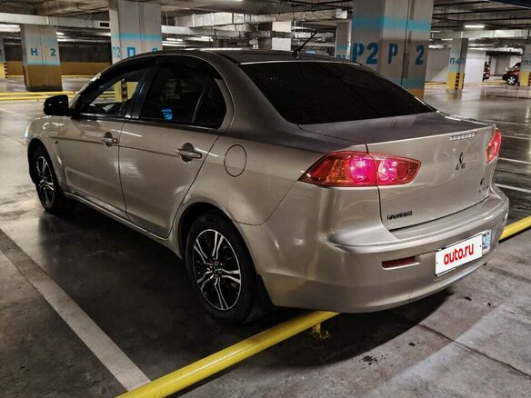 2007 Mitsubishi Lancer X, бежевый, 600000 рублей - вид 10