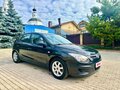 2010 Hyundai i30 I Рестайлинг, чёрный - вид 1
