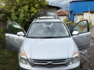 2009 Kia Carnival Grand II, серый, 900000 рублей, вид 1