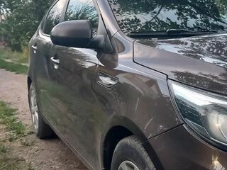 2016 Kia Rio III Рестайлинг, коричневый, 1150000 рублей, вид 4