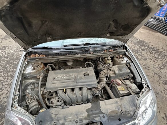 2004 Toyota Corolla IX (E120, E130), серебристый - вид 7
