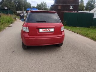 2010 Suzuki SX4 I (Classic) Рестайлинг, красный, 673000 рублей, вид 4